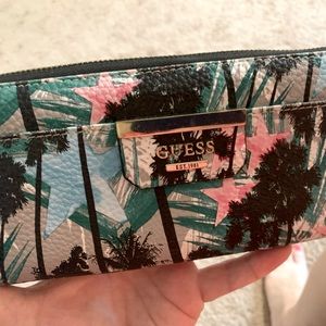 GUESS Wallet.  Tropical print - wrap around zipper